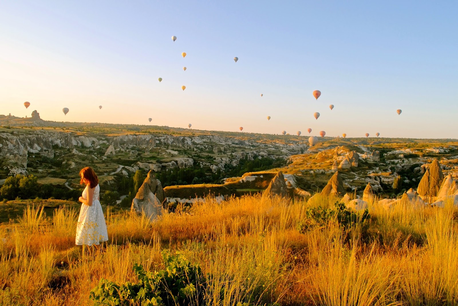 Sunrise and hot air balloons over Goreme in Cappadocia from Goreme sunset point Sunrise and hot air balloons over Goreme from Goreme sunset point