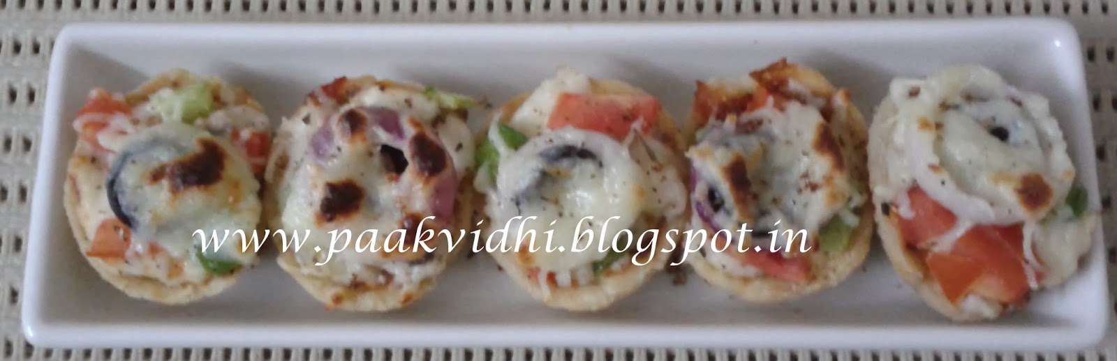 http://paakvidhi.blogspot.in/2014/01/pizza-tarts.html