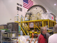 Photo I took of the Japanese module of the International Space Station before it was sent to orbit. Notice the Japanese engineers working on it. (NASA Kennedy Space Center, Florida)