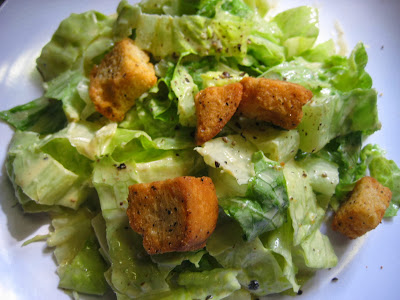 Caesar salad at a restaurant or at home