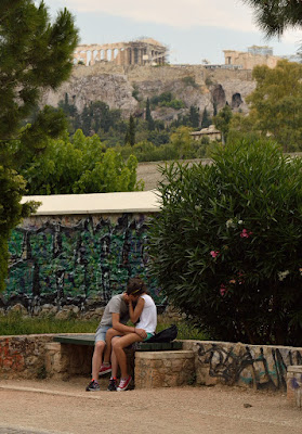 image of couple kissing under the Acropolis