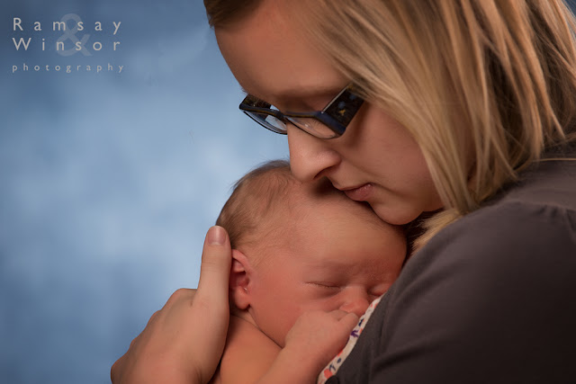 Madonna Portrait of mother and newborn son photographed by grande prairie photographer Keith Winsor of Ramsay and Winsor Photography