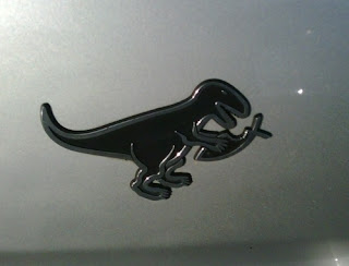 T Rex eats fish symbol