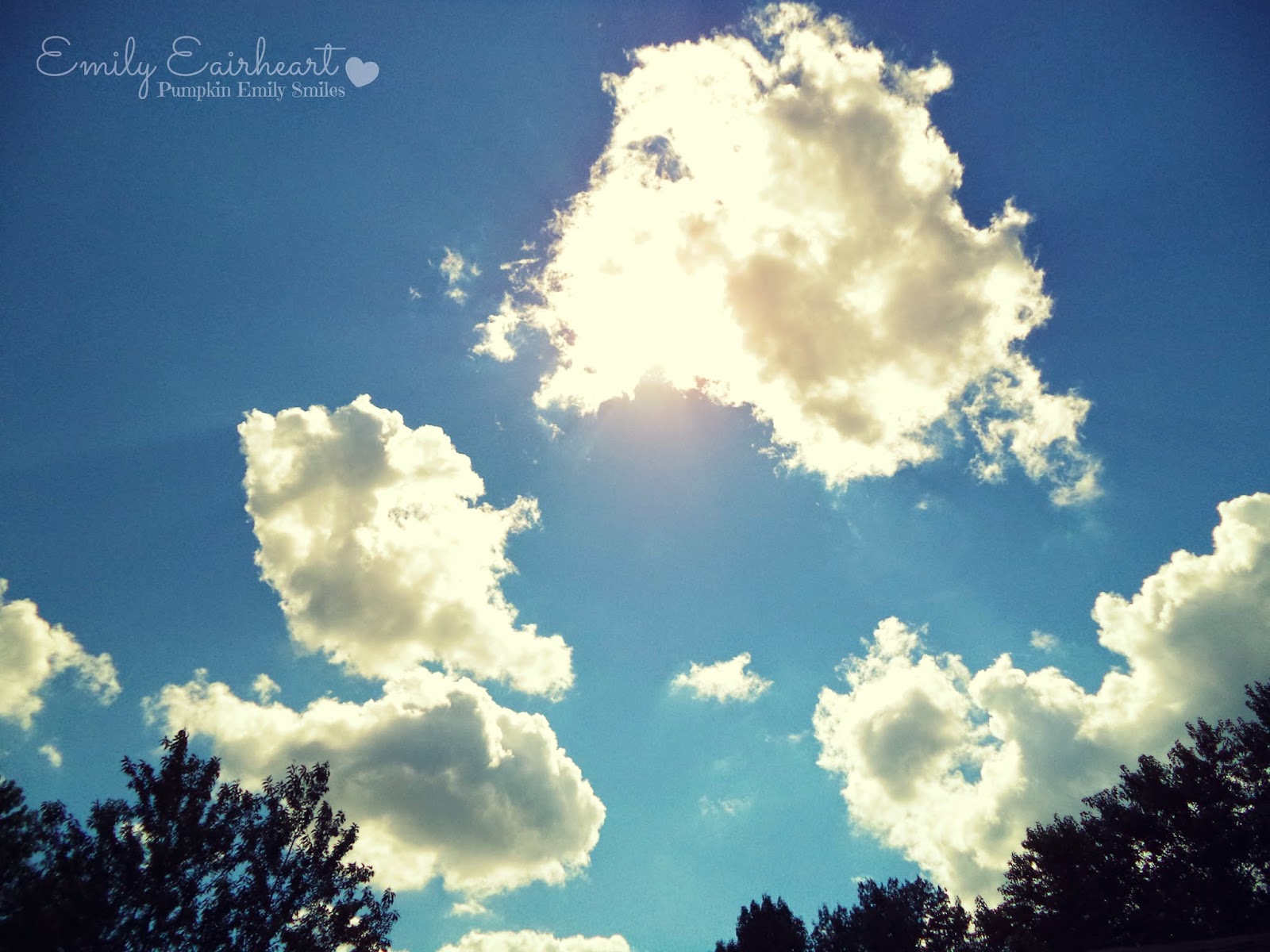 Clouds that look like a baby, people and a shell.