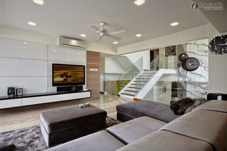 modern minimalist living room: lounge with large gray sofa modern minimalist living room,minimalist living room design ideas,how to design a minimalist living room