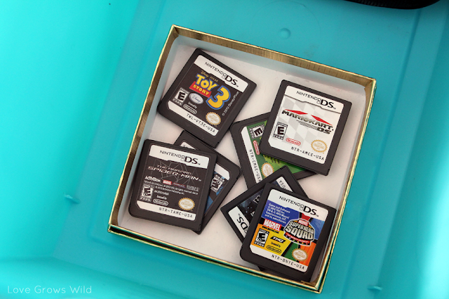 How to Organize Kid's Video Games www.lovegrowswild.com #organize #kids #games #storage