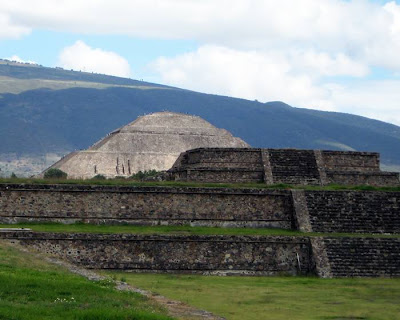 Pyramid of the Sun in Teotihuacan — Mexico Pyramid of the Sun, It was massive, one of the first great cities of the Western Hemisphere. And its origins are a mystery. It was built by hand more than a thousand years before the swooping arrival of the Nahuatl-speaking Aztec in central Mexico. But it was the Aztec, descending on the abandoned site, no doubt falling awestruck by what they saw, who gave it a name: Teotihuacan. A famed archaeological site located fewer than 30 miles (50 kilometers) from Mexico City, Teotihuacan reached its zenith between 100 B.C. and A.D. 650. It covered 8 square miles (21 square kilometers) and supported a population of a hundred thousand, according to George Cowgill, an archaeologist at Arizona State University and a National Geographic Society grantee.