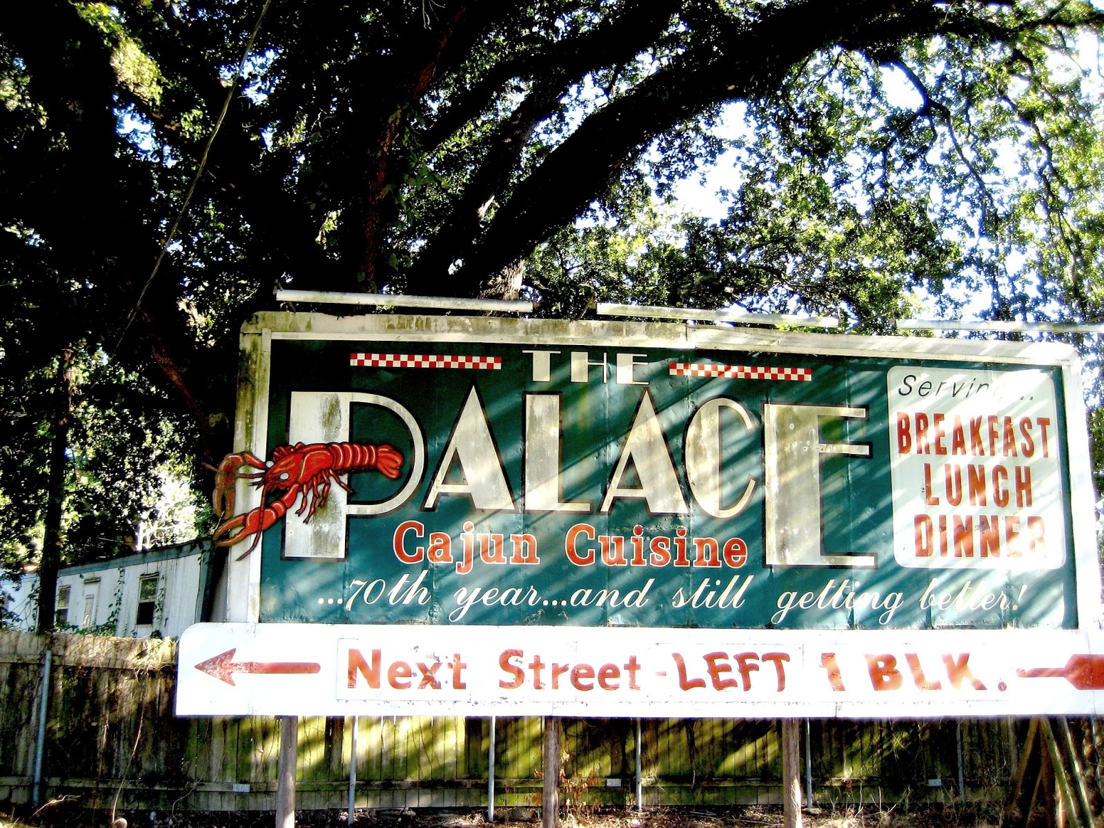 Living Rootless Opelousas The Palace Café Sign