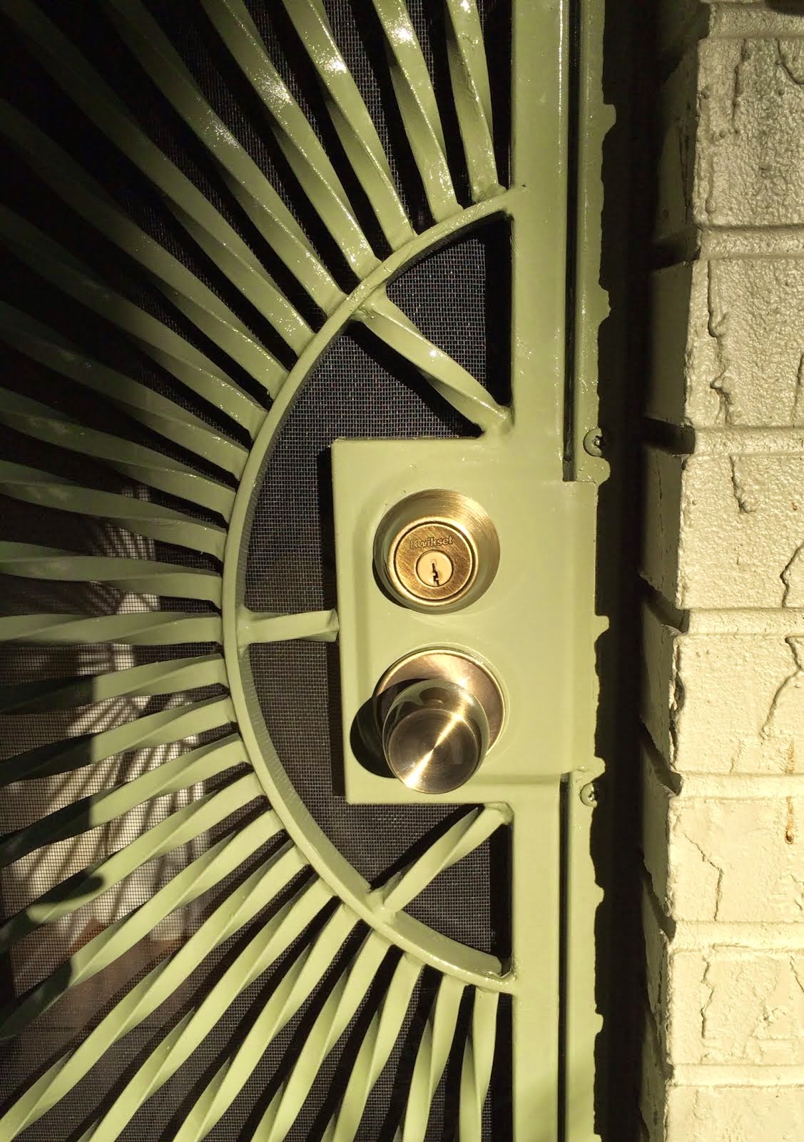 Perfectly Amusing Custom cast iron front door; view of handle