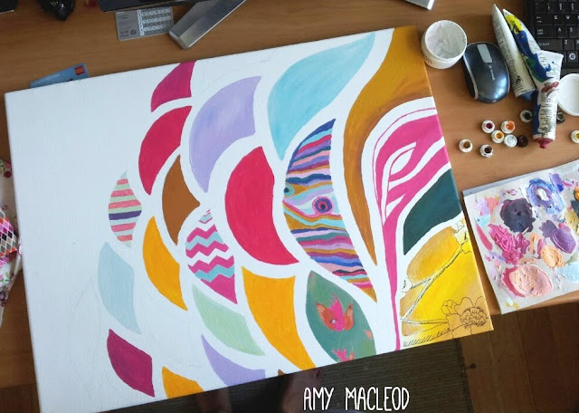 Colourful art in white living room - by Amy MacLeod