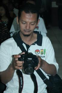 sang fotografer