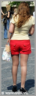 Girl in red shorts