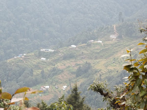 One sample view during the trek of a typical village along the hill side