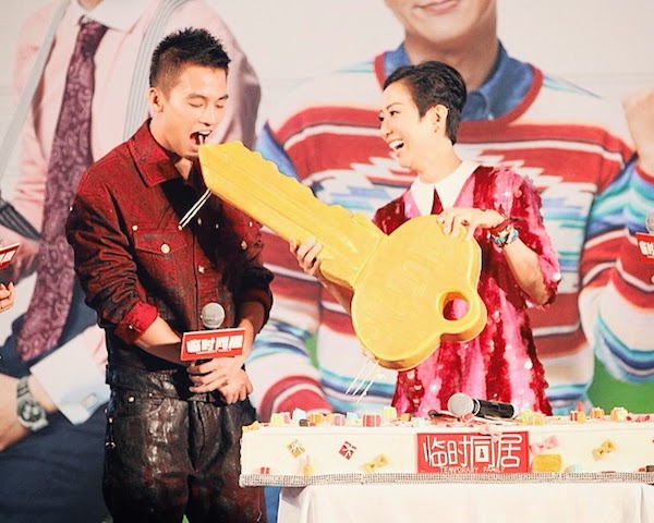 Oho Ou Hao wears Versace Fall Winter 2014 menswear red oiled denim jacket and jeans - Temporary Family Press Conference Hong Kong 17th August 2014