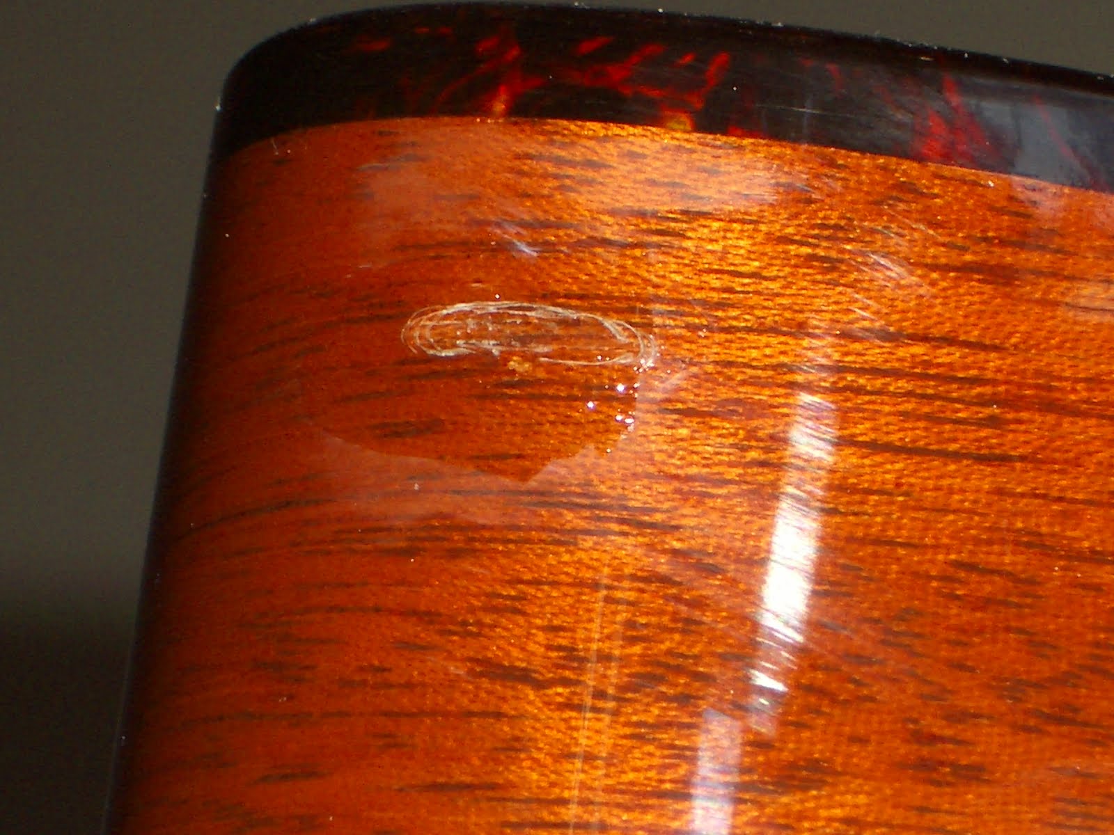 Guitar Snob Fixing a Dented Poly coated guitar