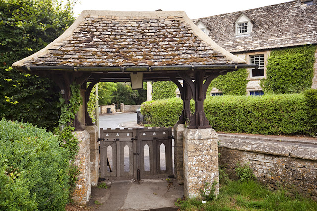 Lych gate at the KIngham church of St Andrews in the Cotswolds by Martyn Ferry Photography