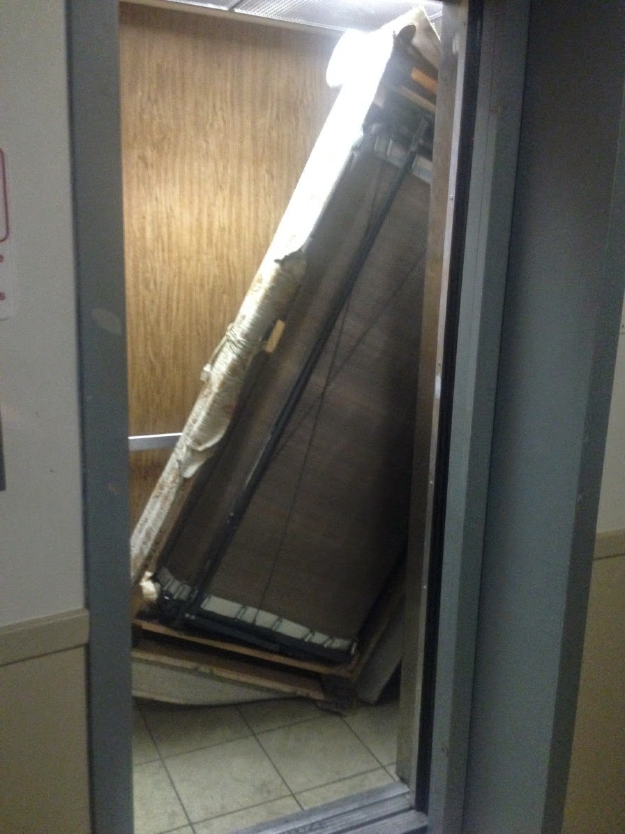 Chicago Elevator Maintenance Colley Elevator Elevator independent service Movers using the