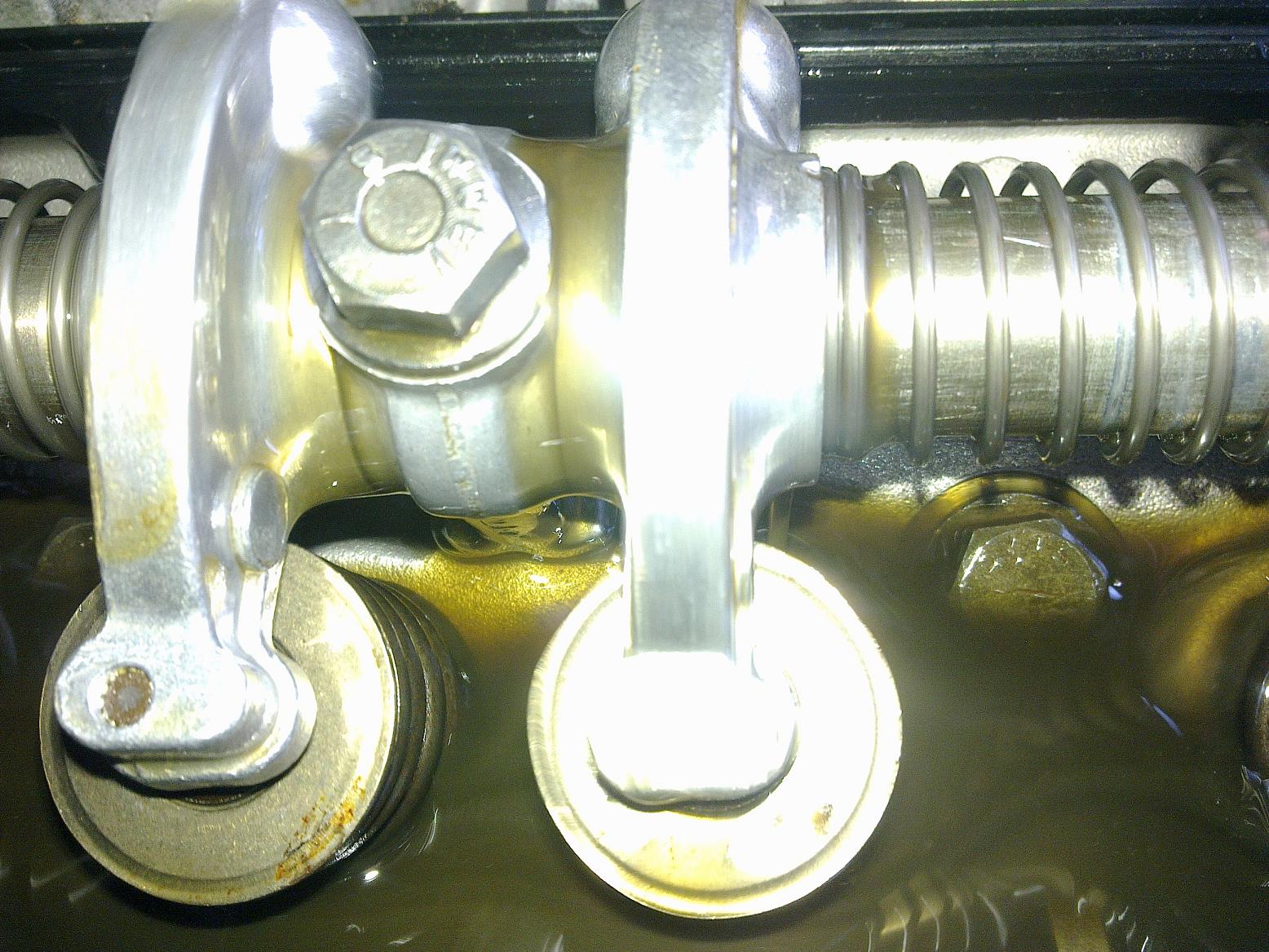 too much oil in lawnmower