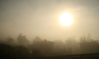 The sun slowly burning through the mist The sun slowly burning through the mist