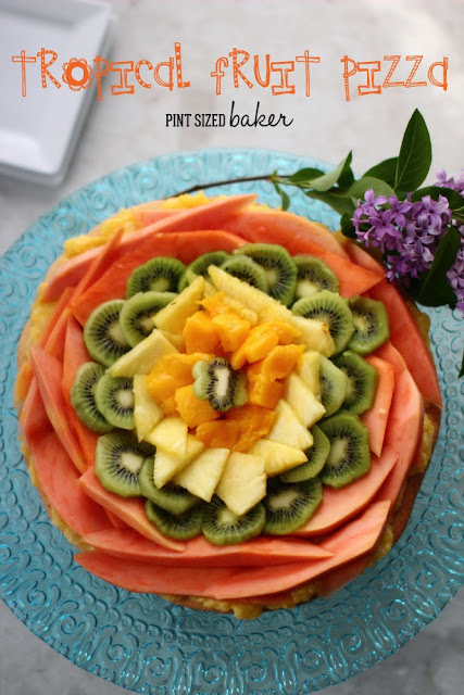 Tropical Fruit Pizza All your neighbors are going to want you to make this Tropical Fruit Pizza for every potluck party.