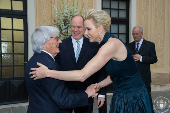 Prince Albert of Monaco and Princess Charlene of Monaco hosted an cocktail party in the Princely Palace courtyard on May 23,2015 in Monaco. 