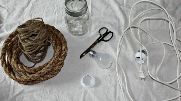 Make a cool mason jar rope light in a jiffy! By Vintage Prairie featured on I Love That Junk