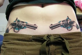 guns tattoos
