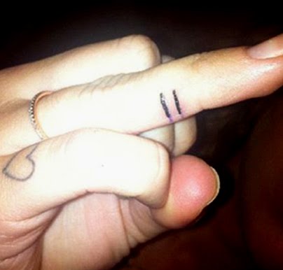 Miley cyrus finger tattoo