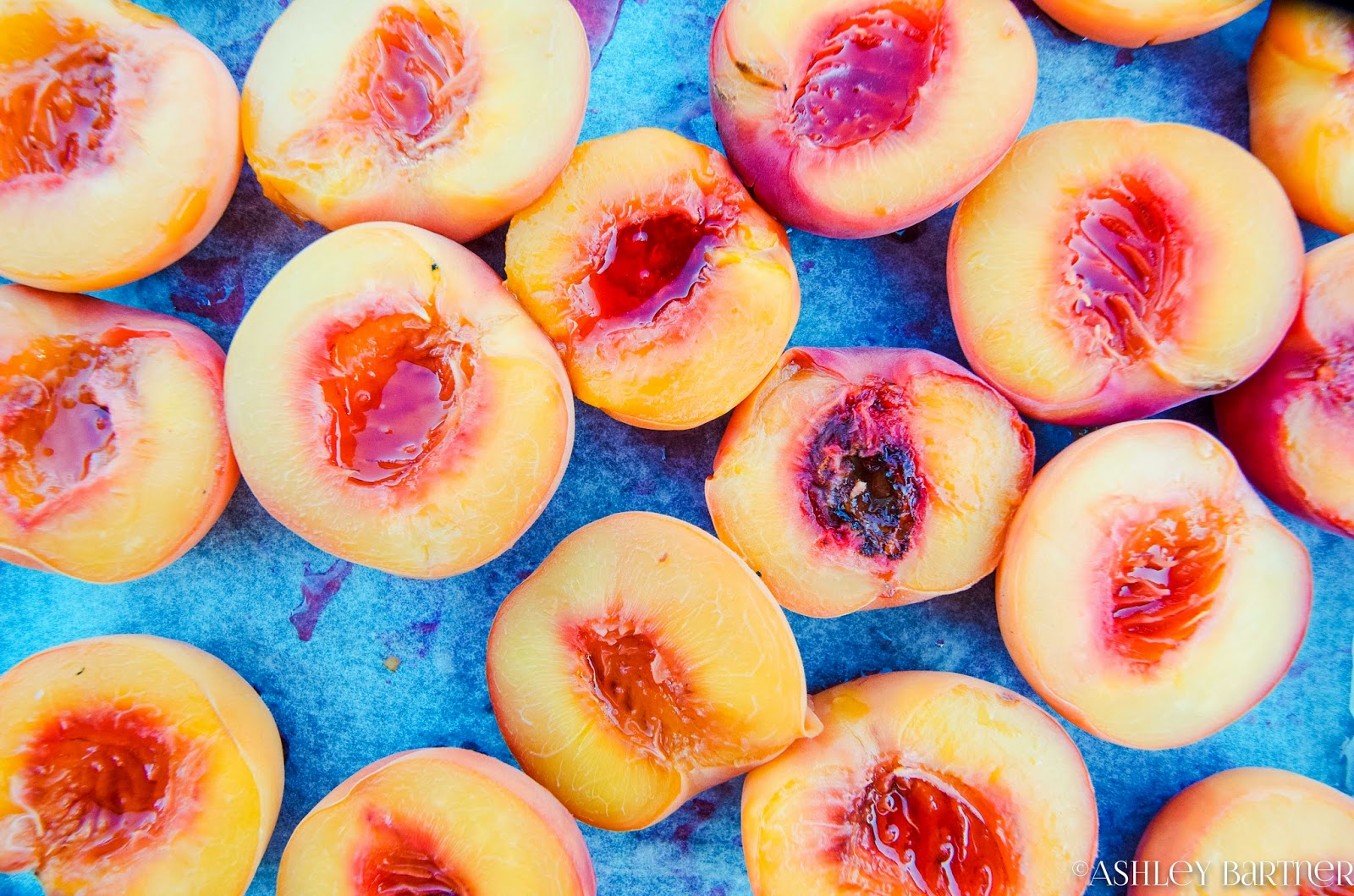 La Tavola Marche Summer Recipe Poached Peaches in White Wine & Rosemary