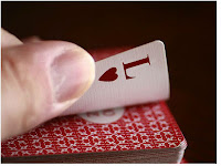 A playing card with the letter L for love