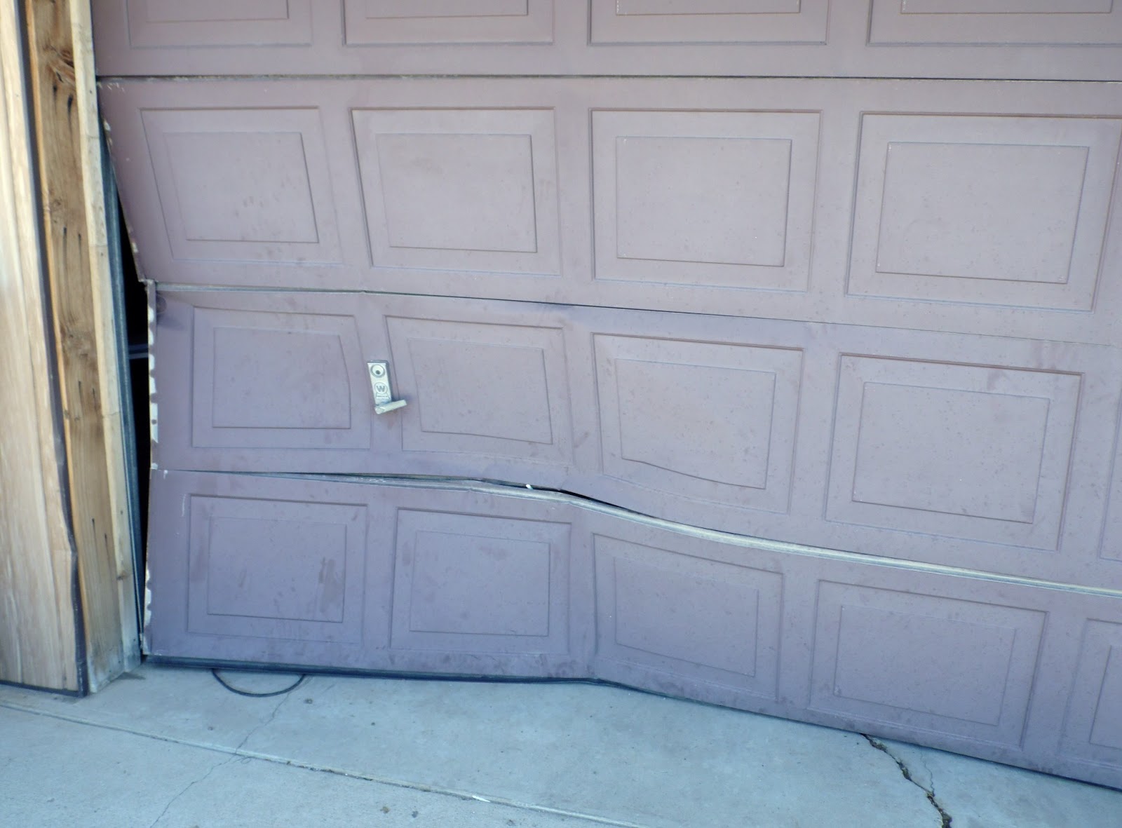 Brandon And Jennifer A Broken Garage Door