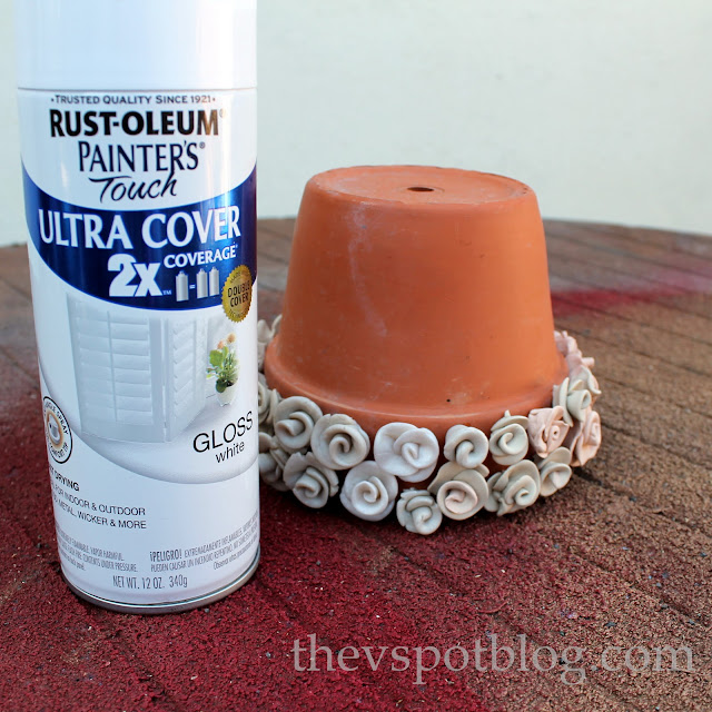 How to spray paint clay roses for a decorative flower pot.