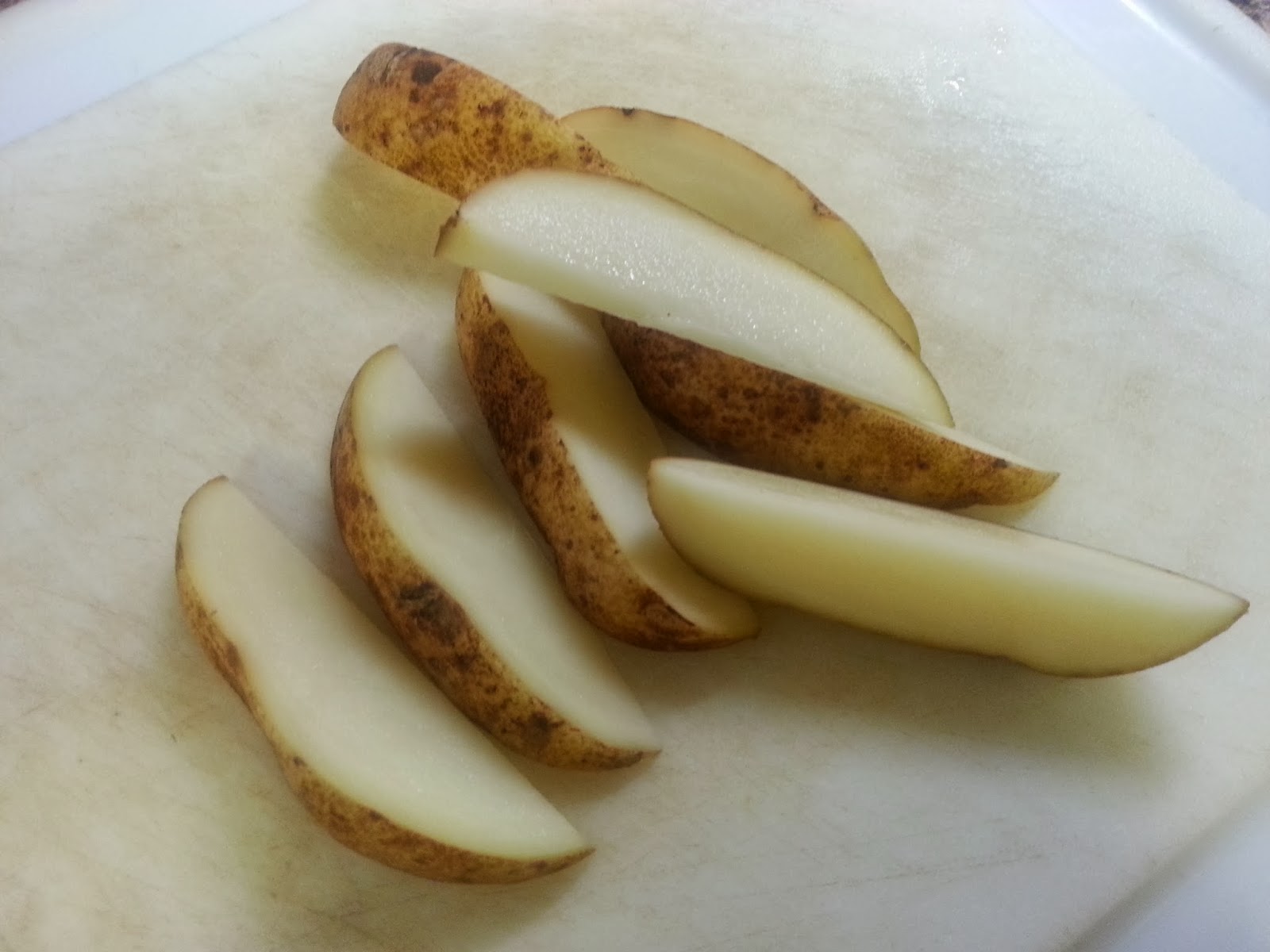 That's 'licious, Mommy! Oven Roasted Onion Potato Wedges