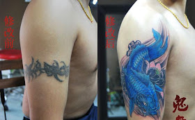 Blue Koi fish tattoo on the arm