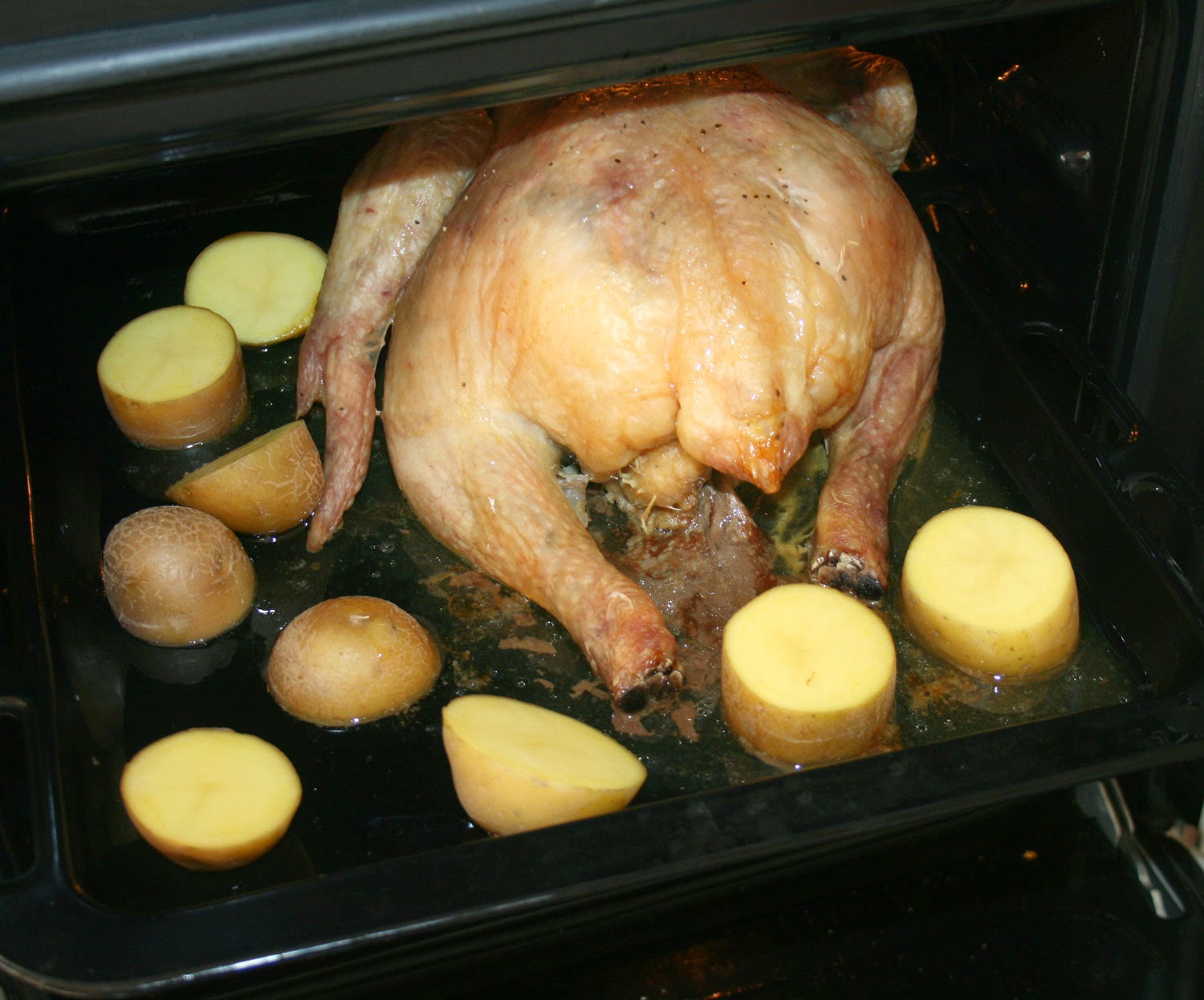 Tatties going in to roast Tatties going in to roast