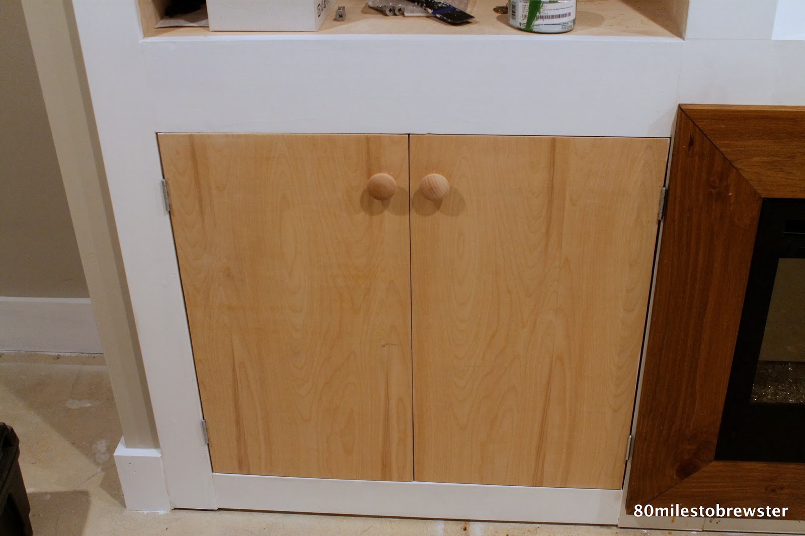 80 miles to brewster wallpapered doors