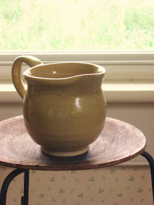 pitcher in window