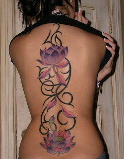 Lotus Tattoo with Tribal Design on Girls Back Body