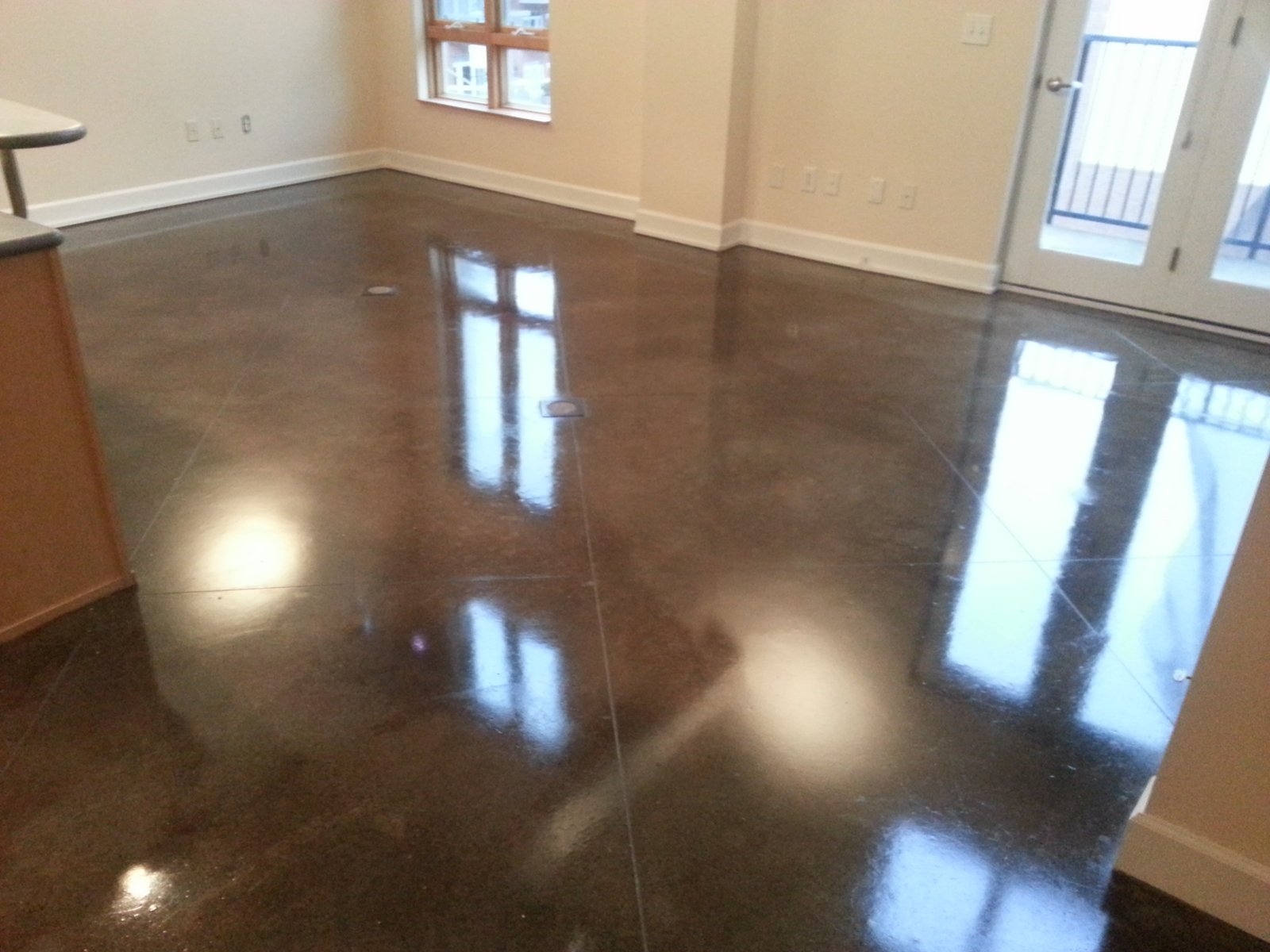 Epo Floors Waxed and buffed stained concrete