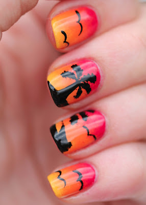 Sunset nail art with palm trees, birds and boat