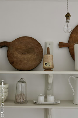 Old wooden chopping board and 'Seletti' crockery