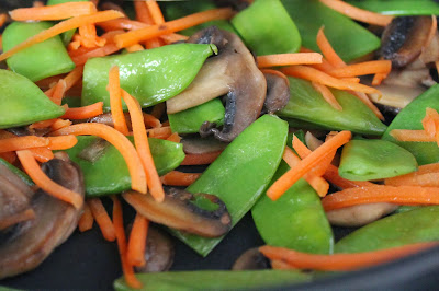 Sautéed snow peas, carrots, and mushrooms