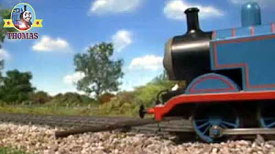 Fallen wooden telegrapher pole little blue train Thomas and friends Annie Clarabel coaches crashing