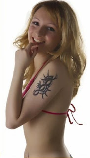 Tribal Tattoo Design on Sexy Girls Arms