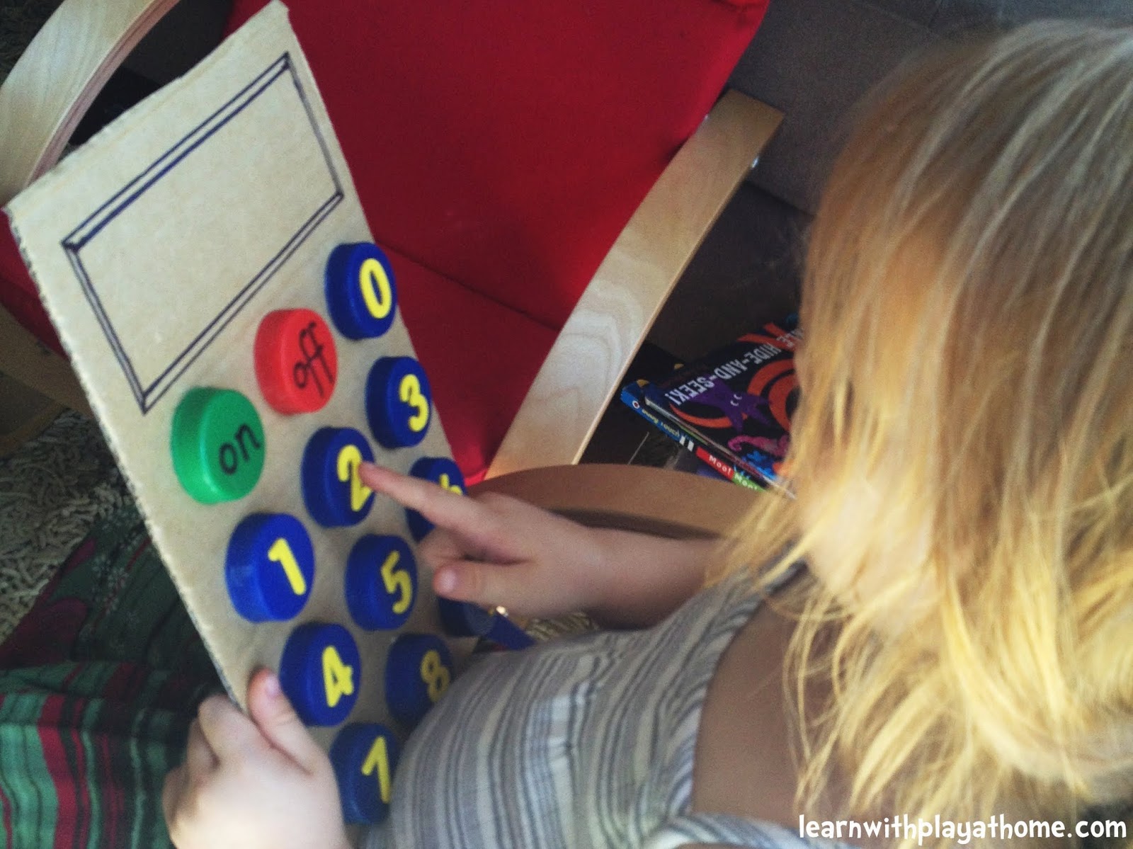 Learn with Play at Home Bottle Top Calculator. Number Writing and