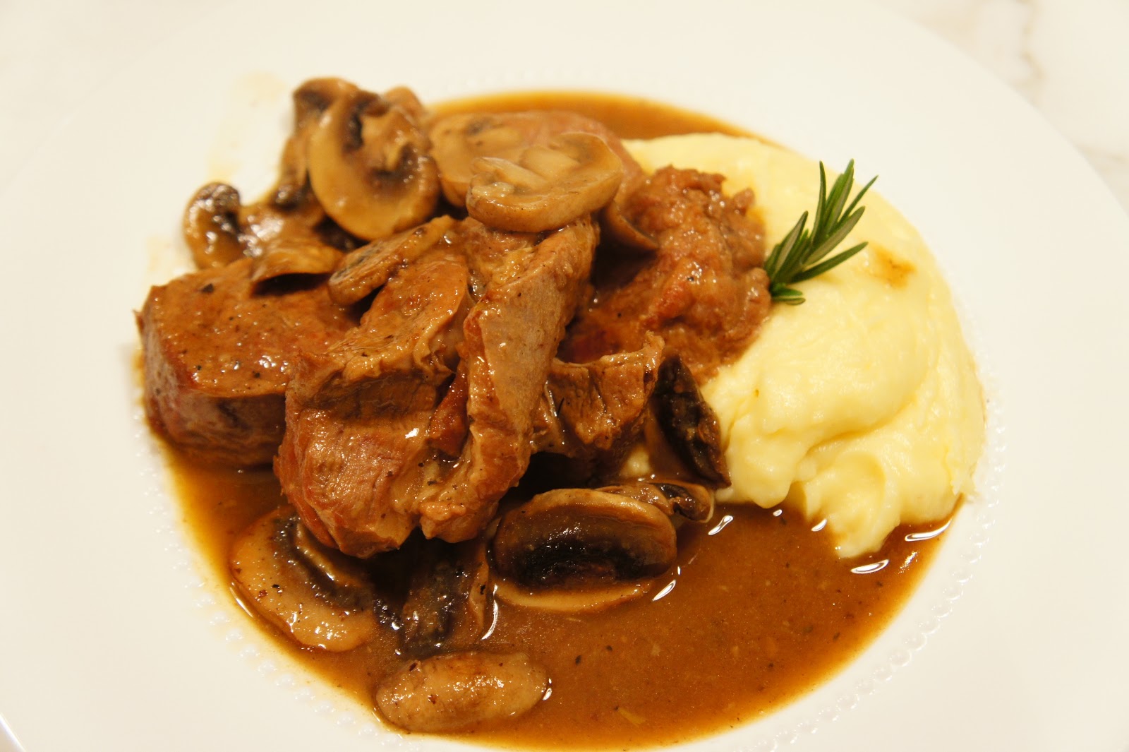 Braised Veal Shoulder with White Wine and Mushrooms
