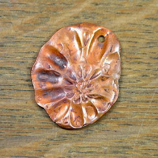 http://www.etsy.com/listing/166485487/one-1-handmade-copper-ammonite-free-form?ref=shop_home_active