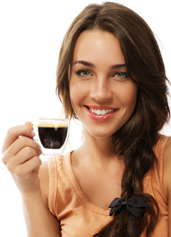 Woman Smiling With a Cup of Coffe