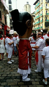 The"Gigantes y Cabezudas( Giants and Big-Heads)" procession in Pamplona.