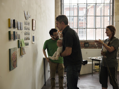 photo of Brian with Neo Rauch (and his baby) in the Studio